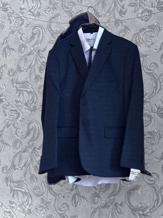 Продам костюм и пальто