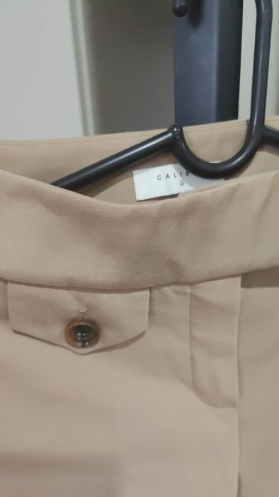 Продам бежевые  брючки