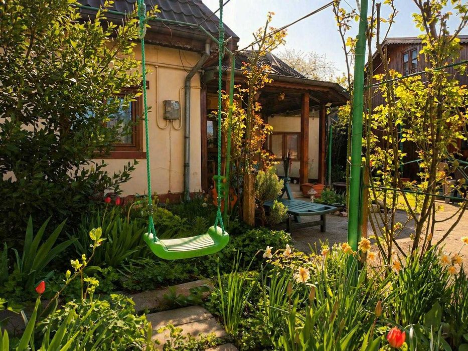 Casă cu 2 locuințe, centrală, garaj și grădină, teren 415 mp, Mezeș/Șos Chitilei /Bucureștii noi