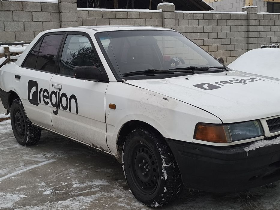 Машина Мазда рабочая лошадка