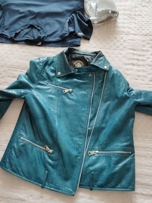 Женская кожаная куртка .