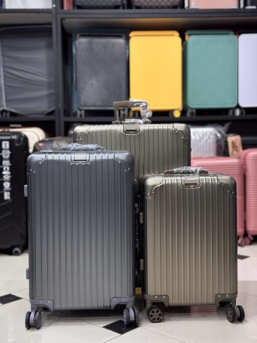 Чемоданы 4 колесные из алюминия