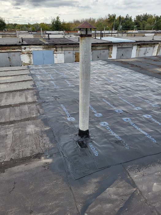 Кровля гаражей бикростом.