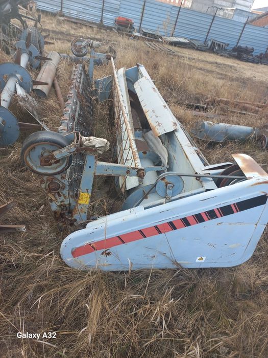 Подборщик на комбайн Вектор