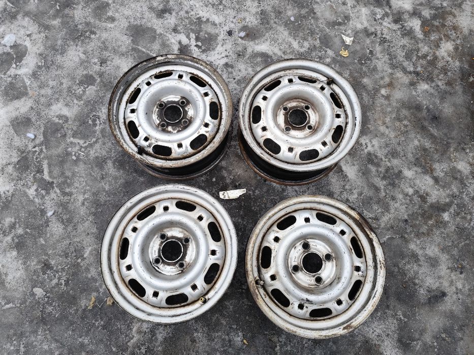 Диски на 14 Volkswagen Passat B4 original с колпаками оригинл