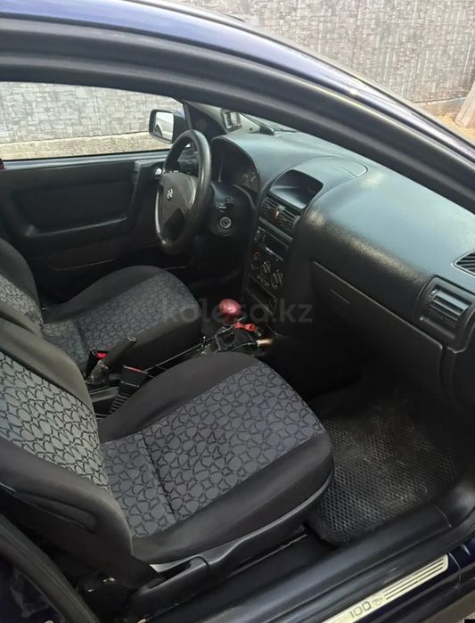 Опель астра машина