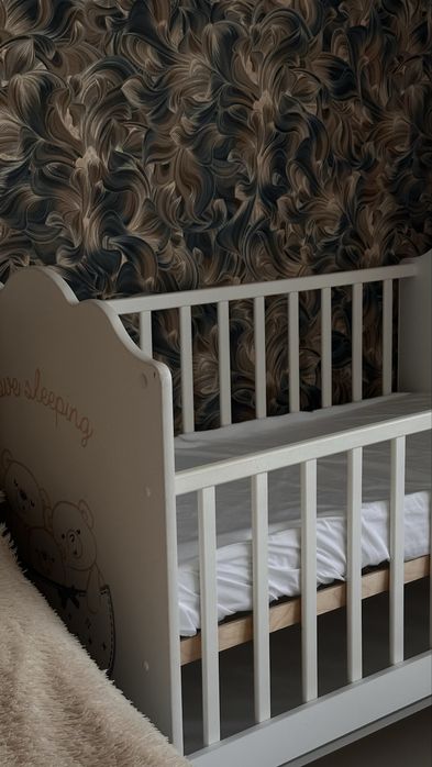 Детская кровать-маятник