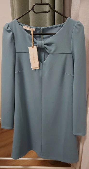 Rochita eleganta cu decolteu funda