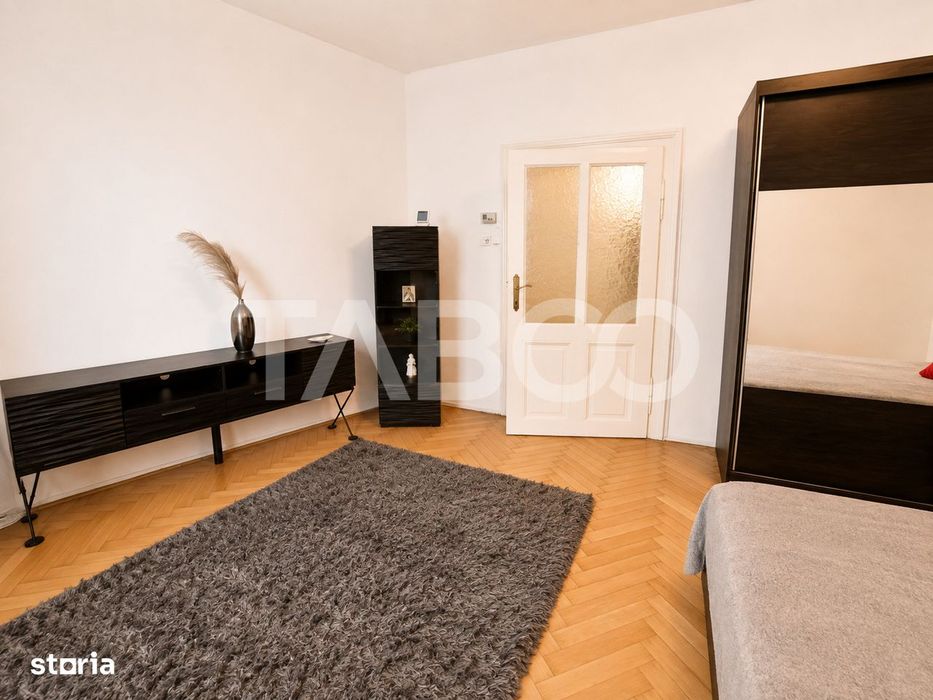 Garsoniera de vanzare aproape de centru cu bucatarie separata