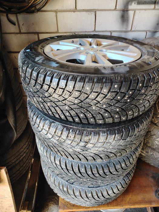 Продам новые зимние шины с дисками