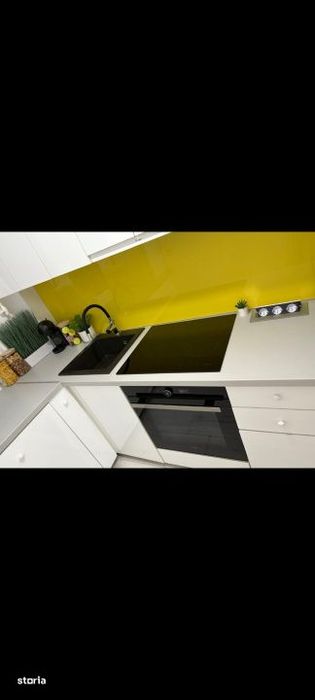 Apartament de 2 camere cu balcon si loc de parcare .