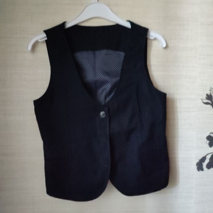 Продам жилет школьный