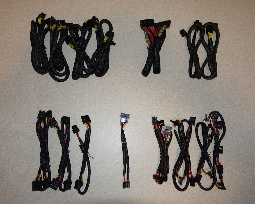 Золотой блок питания XFX XPS-1250W-BEF мощностью 1250Вт