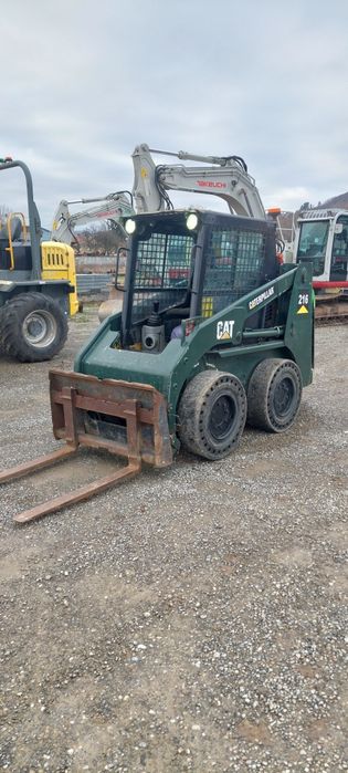încărcător  frontal Caterpillar 216 ,2680 kg