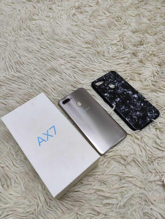 Телефон Oppo AX7