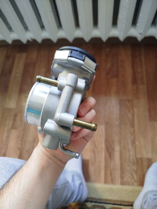 Дроссельная заслонка