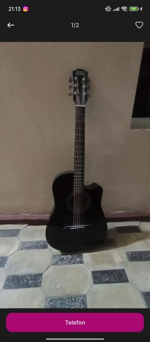 Gitara yangi xali ishlatilmagan