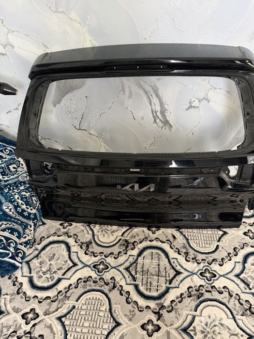 Kia sonet radnoy kapot kirilo orqa bagaj