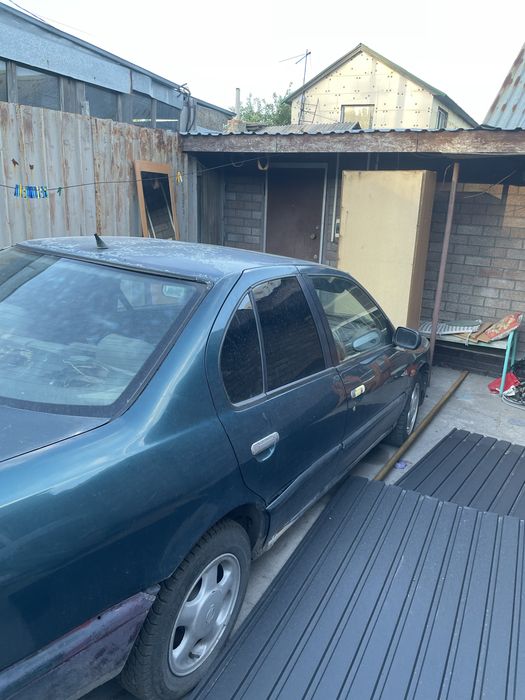 Nissan primera 96 год