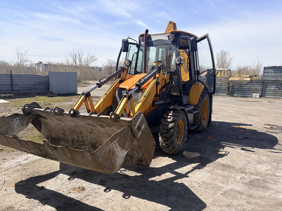 Услуги эксковатора погрузчика.