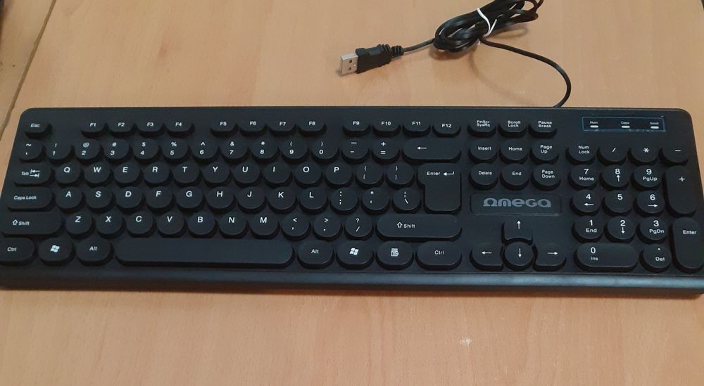 Vând Tastatura Omega cu fir,taste în relief și mufă USB
