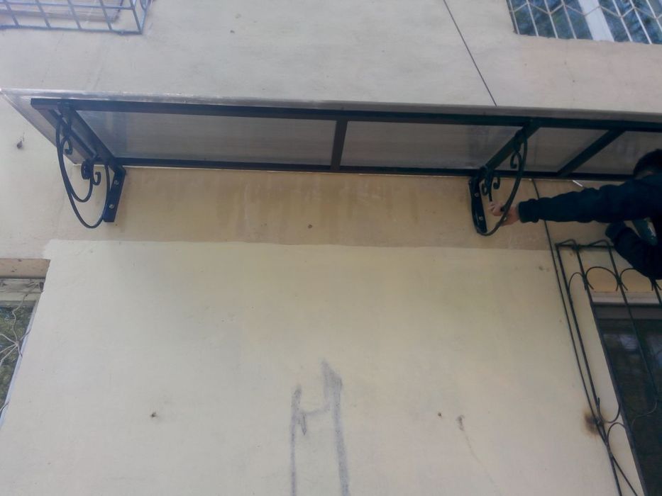 Козырьки. Навесы. Бельевые ролики.