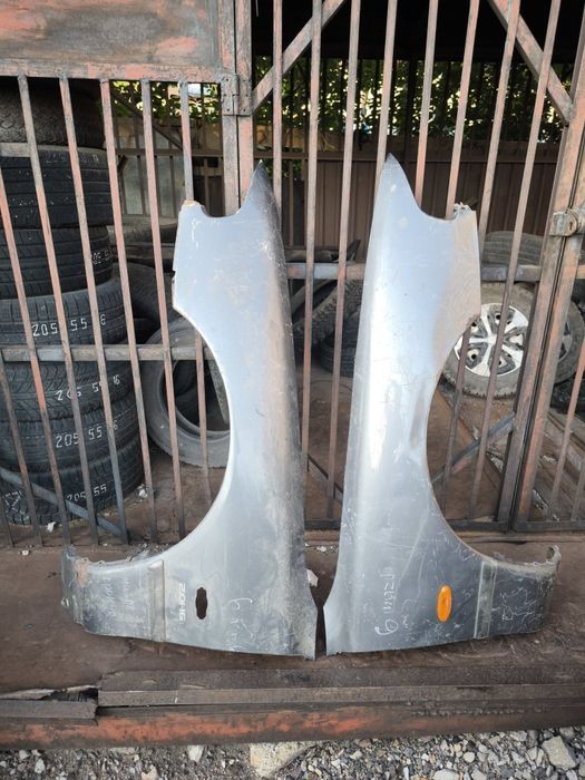 Крыло левое и правое на Мазда кронус