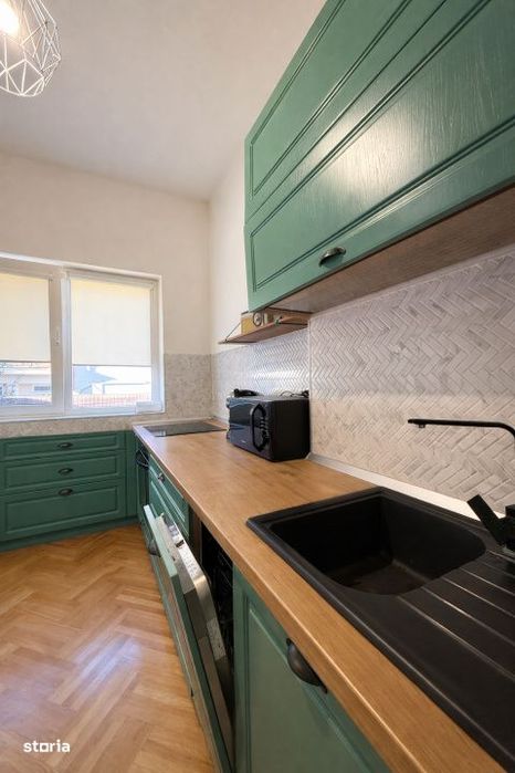 Un apartament cu personalitate, intr-o vila cu farmec – gata de muta