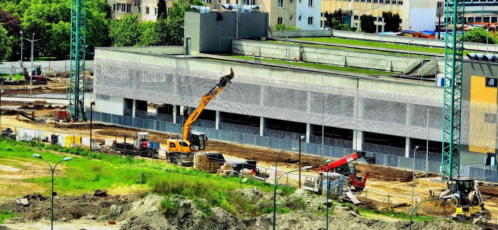 Inchiriere excavator pe pneuri