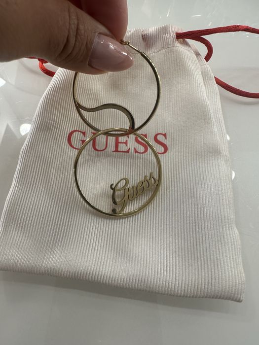 Guess ,една обеца от стомана