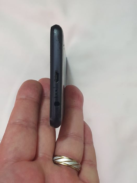Tel. Realme C21.