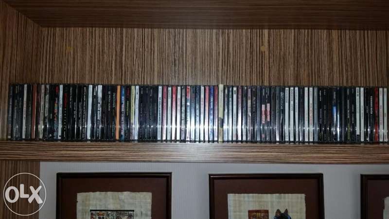 Продавам колекция оригинални CD-та, предимно рок музика