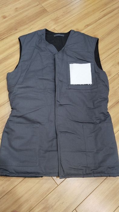 Продам теплую жилетку
