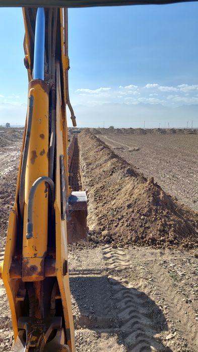 Экскаватор погрузчик услуги