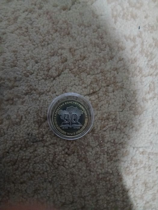 Продам монетка 100 тг 30 лет