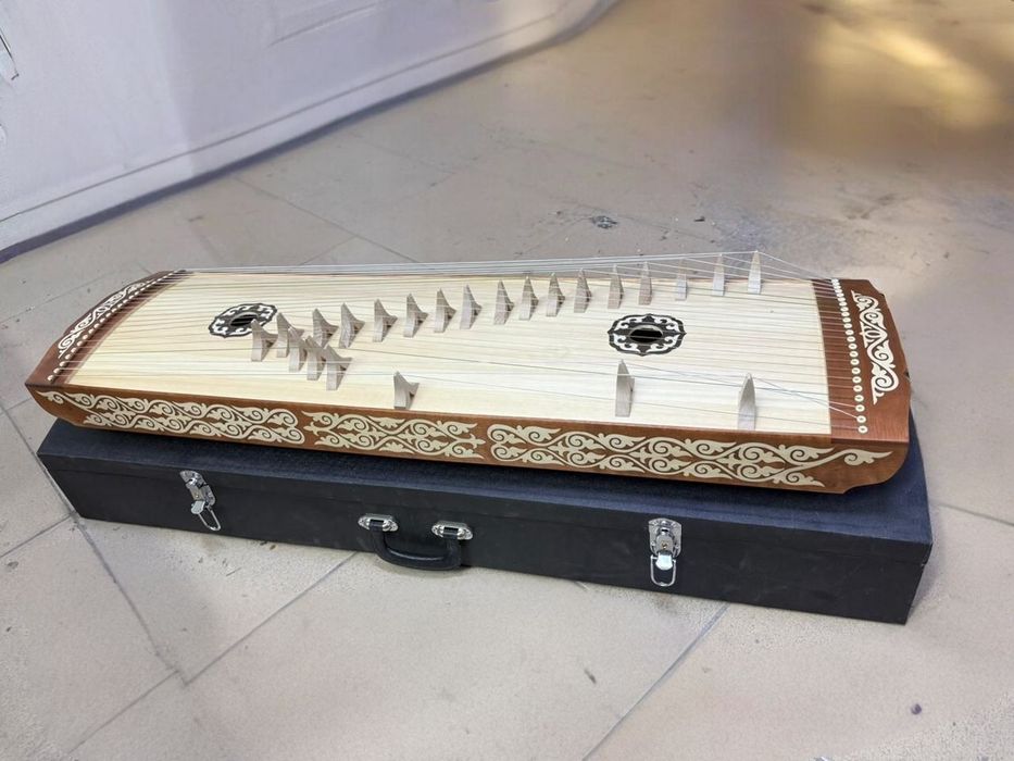 Музыкальный инструмент. Жетіген.