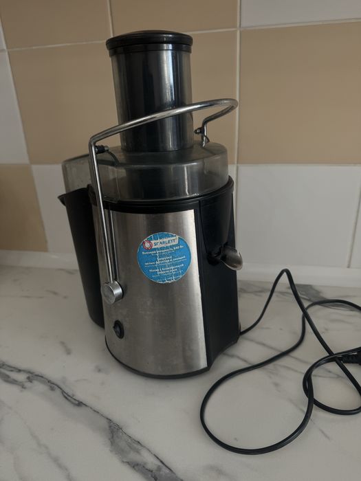 Электрическая соковыжималка