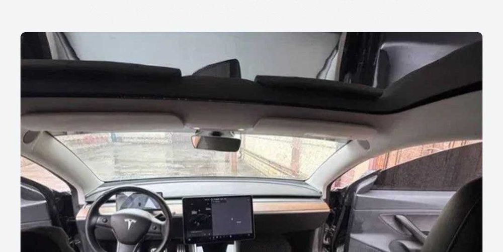 Tesla model 3  Holati ideal to`la zaryad bilan 450km yuradi