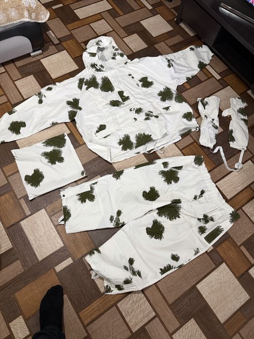 Продам маскировочные костюмы. Одеваються на верхнюю одежду. Зима