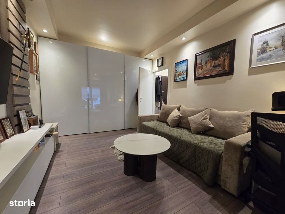COSMOPOLIS - Apartament cu 2 camere si gradina, mobilat si utilat.