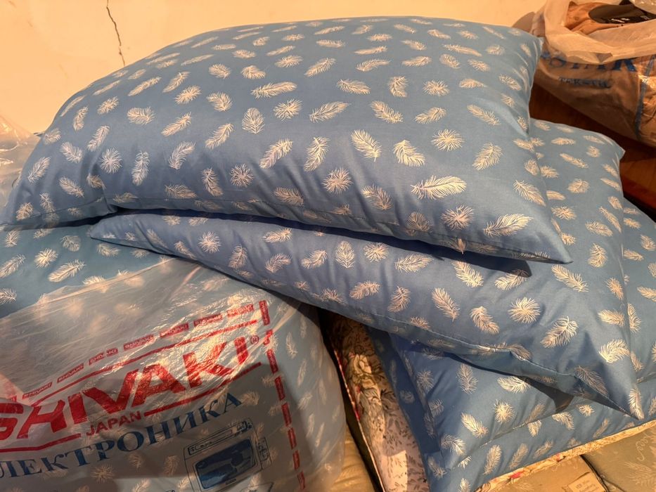 Подушки новые продам
