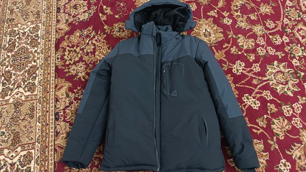 Куртка  новый 52 размер.