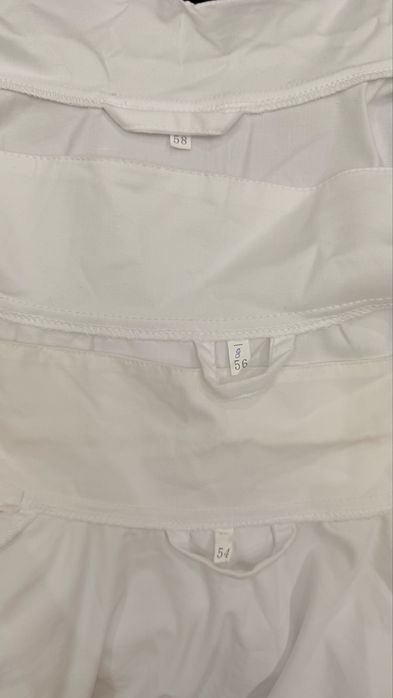 Продам новые белые халаты