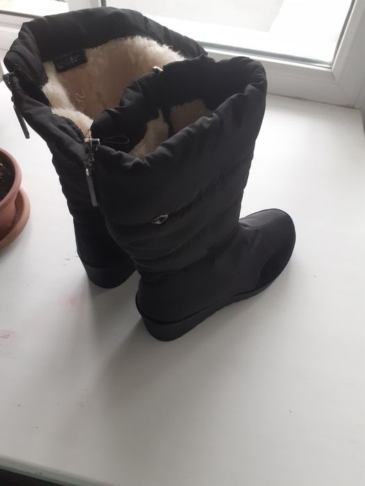 Продам сапоги новые