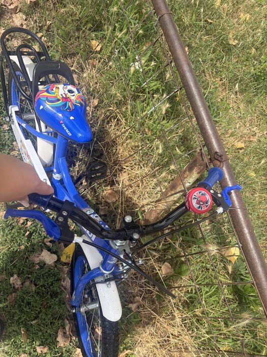 Vand bicicleta cu roti pe 14