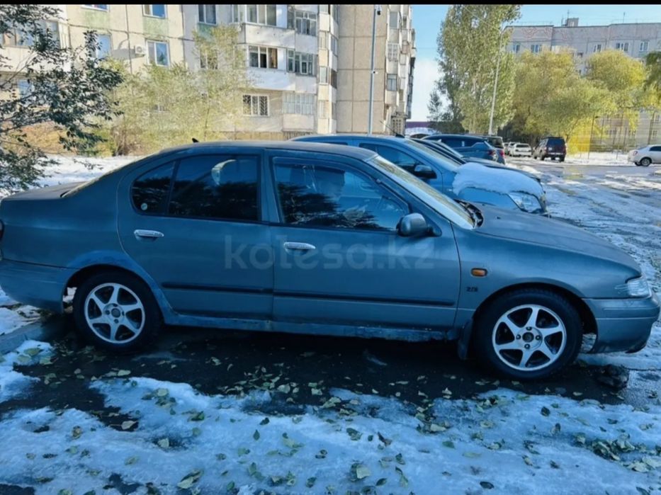 Ниссан примера п11