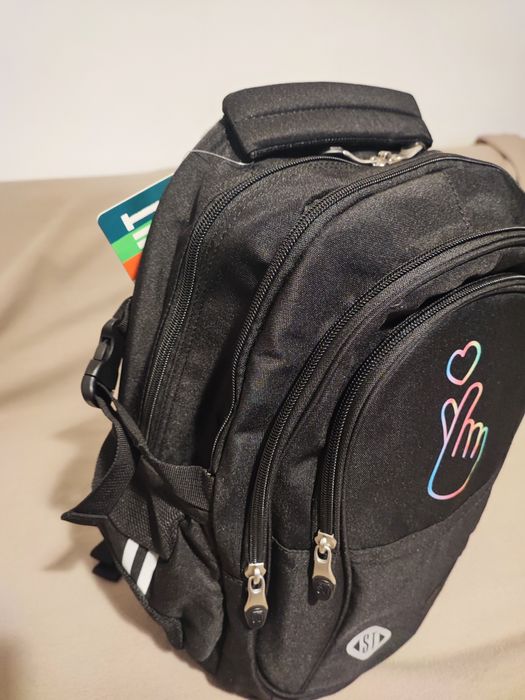 Vând ghiozdan fete Nou St.right