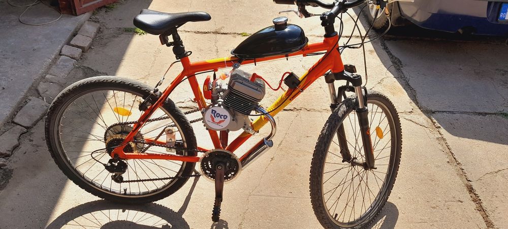 Vând bicicleta cu motor 100cc nou