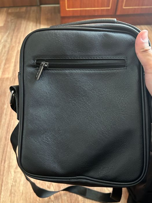 Продается барсетка Jinbaililai