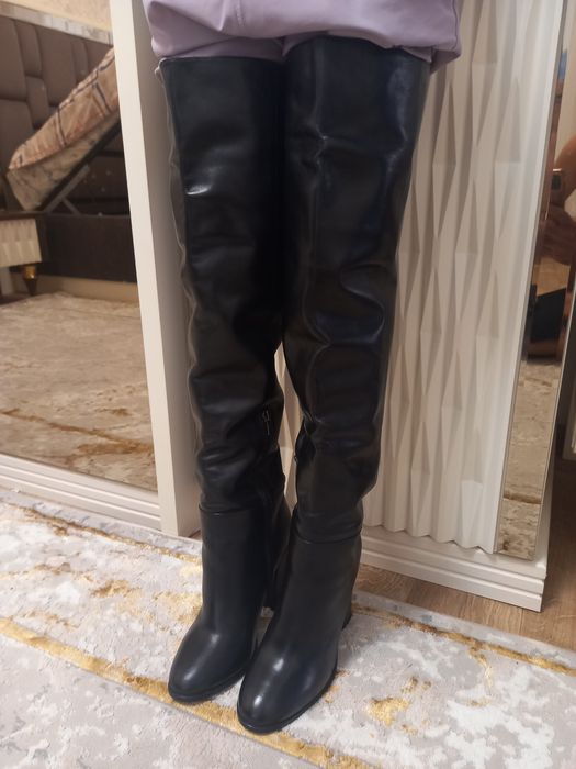 Продам зимние сапоги новые